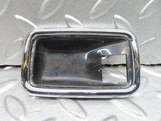 W123 door opener chrome frame right used OEM