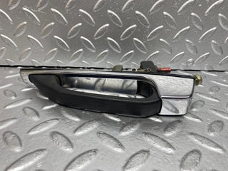 W123 rear exterior chrome handle used OEM