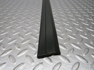 W201 Baby Benz rear left door lower moulding trim used OEM