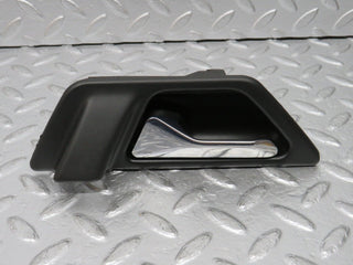 W124 Wagon front left interior door handle used OEM