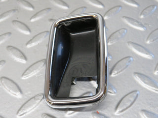 W123 chrome frame for door opener left used OEM
