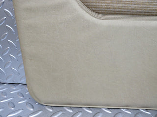 W123 front left door card beige used OEM
