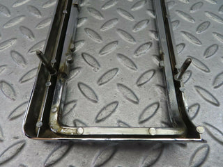 W115 tail light chrome frame right side used OEM