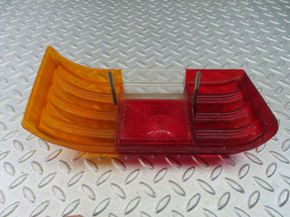 W114 rear left tail light lens used OEM