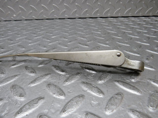 W109 windscreen wiper arm left side used OEM