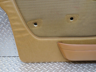 W123 front left door card palomino used OEM