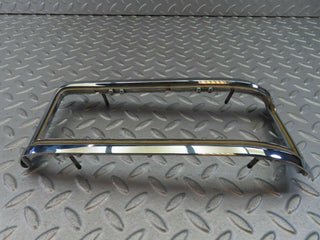 W115 tail light chrome frame left used OEM