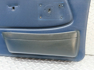 W123 front left door card blue used OEM