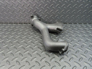 W111 exhaust manifold used OEM
