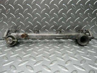 W124 Coupe fuel injector rail used OEM