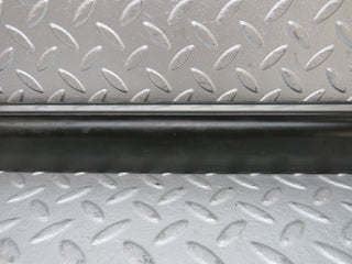 W123 front left door lower moulding trim used OEM