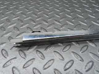 W111 front left door window chrome frame used OEM