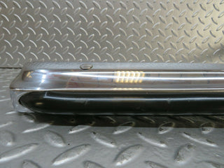 W116 front left upper bumper corner used OEM