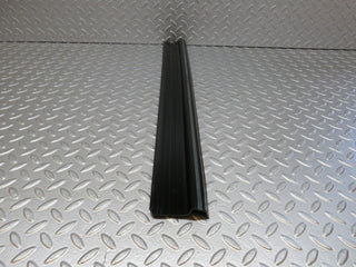 W123 front left door sill trim black used OEM