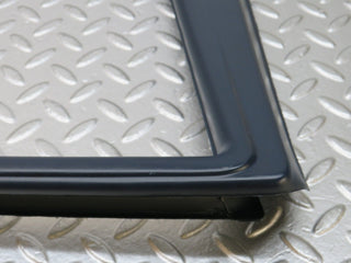 W140 front left door window trim used OEM