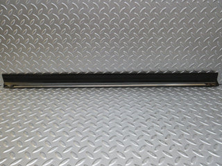 W123 front left door lower trim used OEM