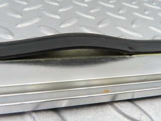 R107 SLC roof chrome moulding left side used OEM