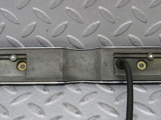 W109 number plate light trunk chrome used OEM