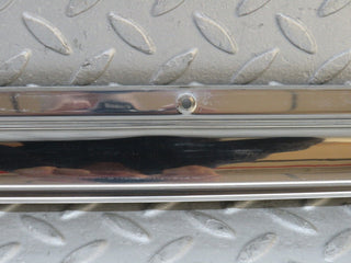 W109 front left door sill chrome used OEM