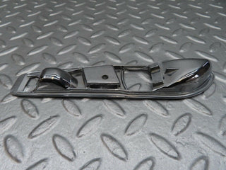 R107 SLC interior door handle chrome surround left used OEM