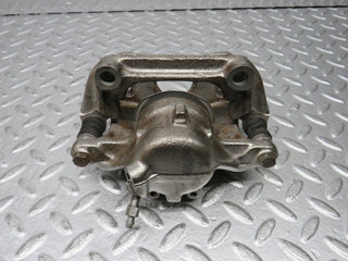 W124 Wagon front left brake caliper used OEM