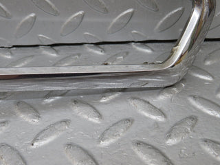 W108 tail light chrome frame left used OEM