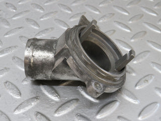 W210 thermostat housing used OEM