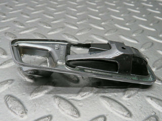 W123 Wagon chrome frame for door opener left used OEM
