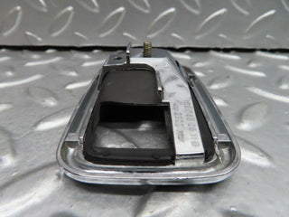 W123 chrome frame for door opener left used OEM