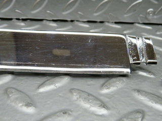 R107 SLC trunk chrome handle pair used OEM