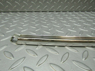W115 rear left chrome window channel used OEM