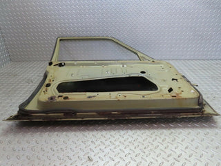 W123 front left door used OEM