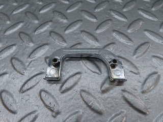 W123 left interior chrome door latch trim used OEM