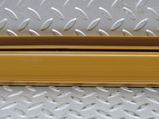 W123 front right door sill trim palomino used OEM