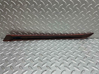 W116 front left passenger side window trim fill used OEM