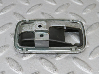 W108 chrome frame for door opener left used OEM