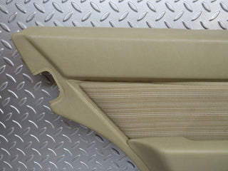W124 rear left door card beige used OEM