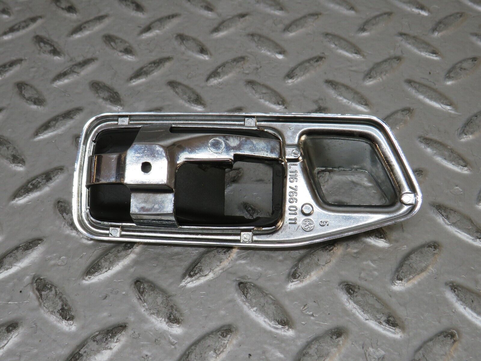28810 Mercedes-Benz W123 230E Chrome Frame For Door Opener  Left 1167660111