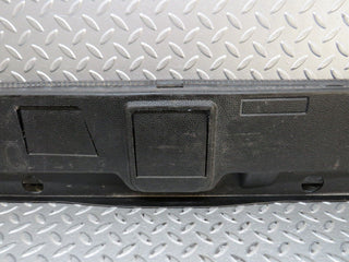 W124 Coupe trunk lock trim panel used OEM