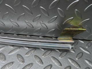 W123 rear right door chrome window channel used OEM