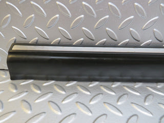 W123 front left door lower trim used OEM