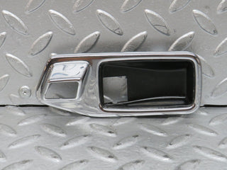 W123 chrome frame for door opener left used OEM