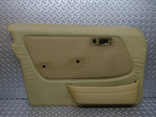 W123 front left door card beige used OEM