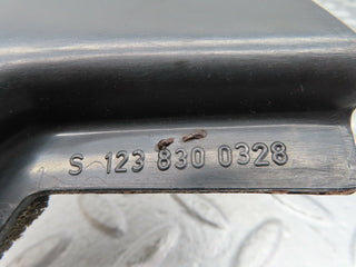 W123 water drain left side used OEM