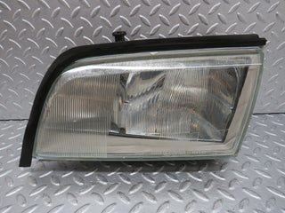 W202 headlight left side used OEM