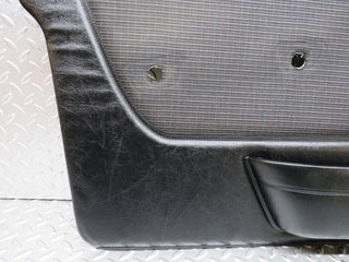 W123 Wagon front left door card black used OEM