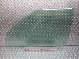 W124 Wagon front left door window glass used OEM