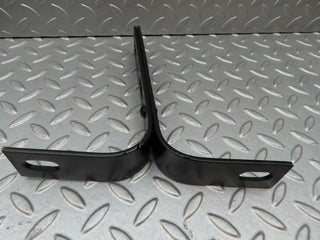 W115 front bumper bracket pair used OEM