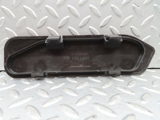 C140 headlight access panel pair used OEM