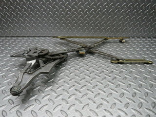 W123 Wagon front left power window regulator used OEM